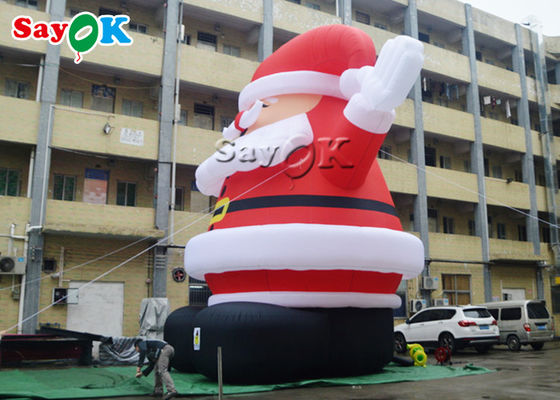 υπαίθρια Χριστούγεννα διογκώσιμος Άγιος Βασίλης 8m που φορούν το Red Hat