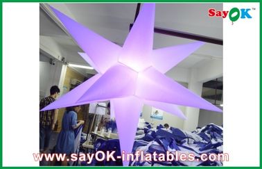 Πορφυρά κρεμώντας νάυλον οδηγημένα ύφασμα ανάβοντας διογκώσιμα λουλούδια διακοσμήσεων